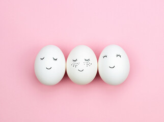 Easter eggs with painted cute faces. Top view.