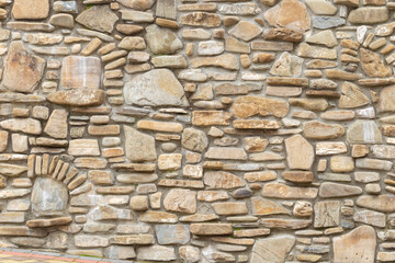 Gray stone wall background. Stone wall texture. Old castle stone wall texture background. Stone wall as background or texture. Part of a stone wall, for background or texture. 