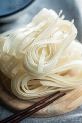 Dried white rice noodles. Raw pasta. Uncooked noodles.