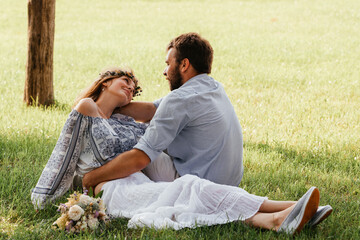 Eclectic rustic wedding couple. Intimate ceremony at backyard