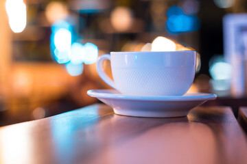 cup of coffee on bokeh background