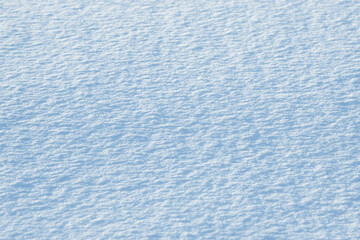 Fresh clean white snow background texture. Winter background with frozen snowflakes and snow mounds. Snow lumps. Seasonal landscape details. Cold weather.