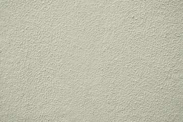 Rustic textured light brown cement wall. Concrete backdrop