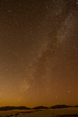 USA, New Mexico, White Sands National Monument. Milky Way over desert at night.