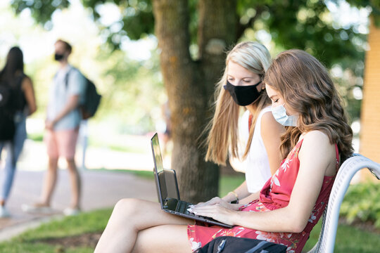 Covid: Friends Use Laptops To Take Web Based Class