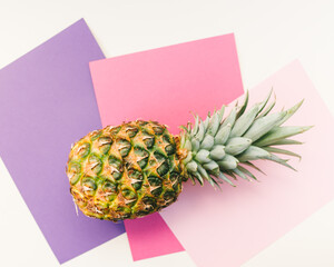 Creative  healthy food concept made of  pineapple  tropical seasonal summer fruit on overlapping paper in trendy Pastel Colors: Pink , purple   background. Healthy lifestyle diet vitamins. Flat Lay - 420586949