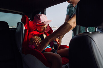 Father and daughter in a car