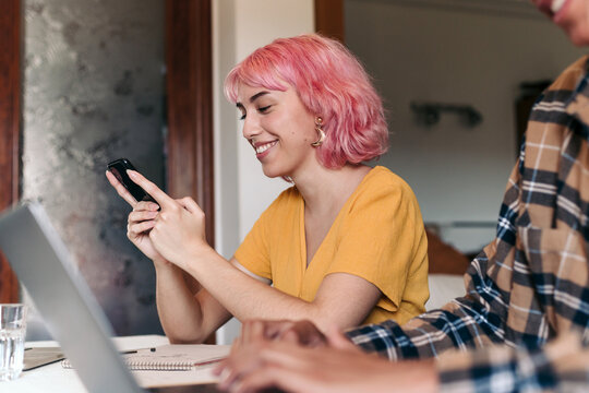 Teenagers studying at home
