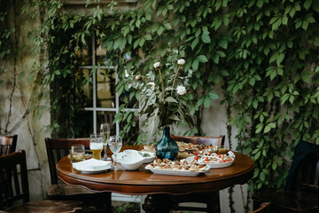 celebration table decoration with flowers candles fruits at the restaurant