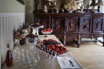 celebration table decoration with flowers candles fruits at the restaurant