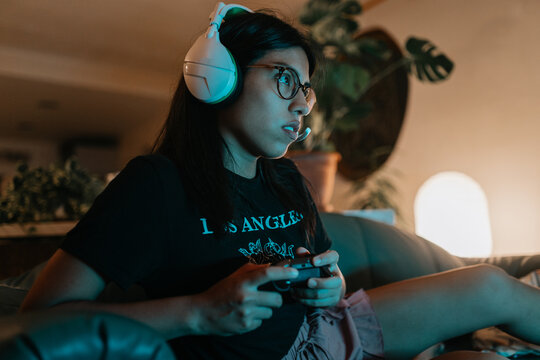 Woman gaming at home