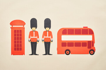 Telephone box and double decker near Queen guards