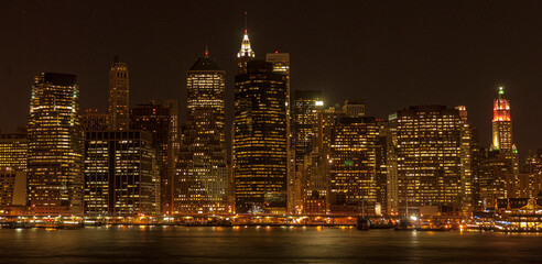 Manhattan skyline at night from Brooklyn, New York.