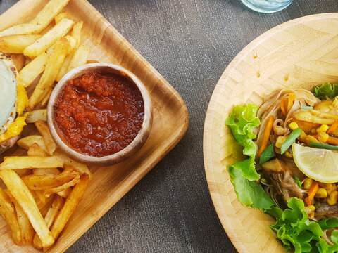 Veggie Burger and French Fries. Salad and French fries