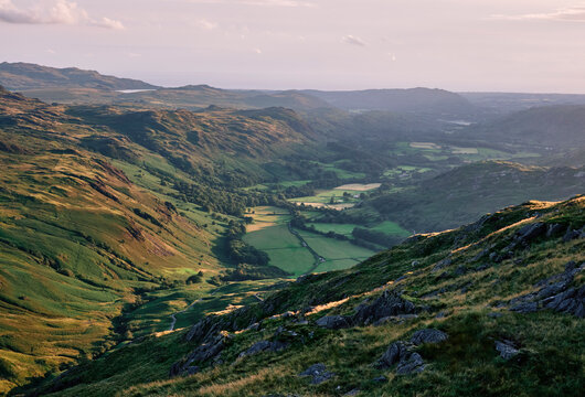 Sunlight in Eskdale Valley at sunset. Hard Knott Pass, Lake District, Cumbria, UK.