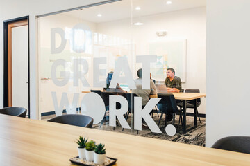 Casual Professionals Meeting in Office Space