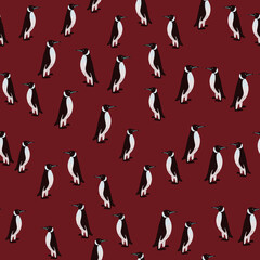Abstract exotic animal seamless pattern with black and white colored penguins ornament. Maroon background.