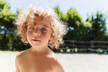 Portrait of a little curly girl
