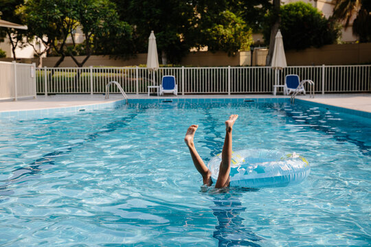 A Kid In A Swimming Pool