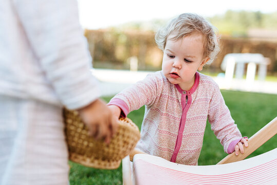 little girl in pajamas outdoor for easter hunt