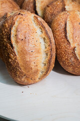 Craft bread on the table at the bakery. The concept of small industries and healthy food