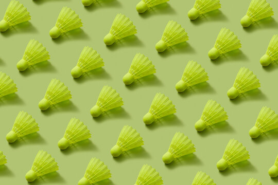 Sport pattern from shuttlecocks of lemon color.