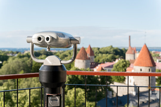 Binoculars With View Of Old Town Towers