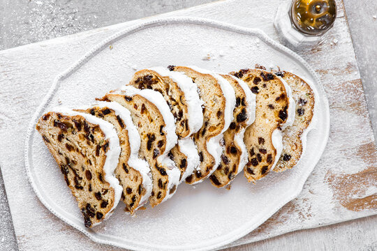 Stollen Christmas loaf with dried fruit and powered sugar