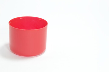 Red cap made of plastic material