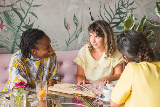 Group Of Female Entrepreneurs Having A Meeting In The Coffee Shop