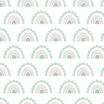 Stylish seamless pattern with rainbows and painted stripes.
Doodle pattern with rainbow for background, wallpaper, texture, decor.