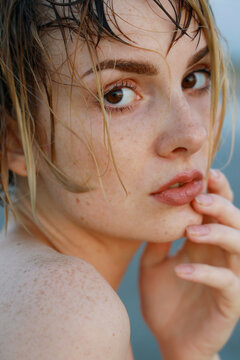 portrait of young woman with wet hair