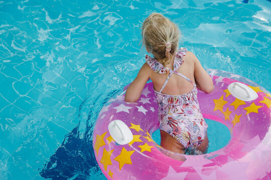 Girl in the swimming pool