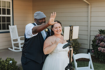 Bride and Groom Interacting with Guests at Social Distance Wedding during COVID