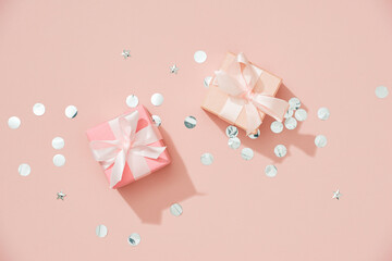 Background Xmas design of realistic gifts box and glitter silver confetti