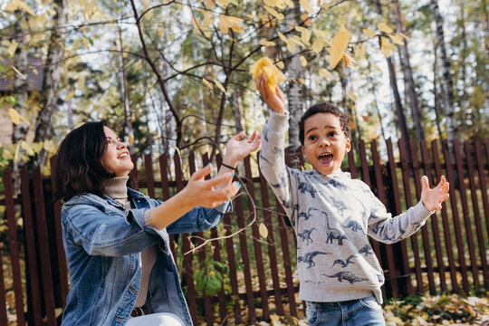 mom and son playing in the back yard