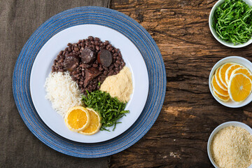 Feijoada dish of typical Brazilian food Top view