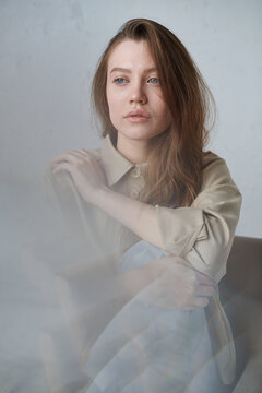 Woman behind abstract blur