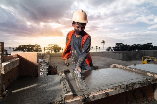 Workers On Construction Site