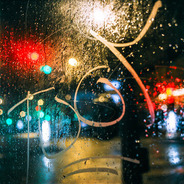 City lights at night view from a phone cabine in Paris