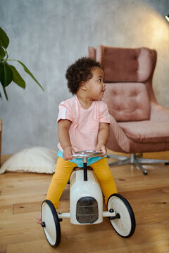 little girl playing and spending time at home