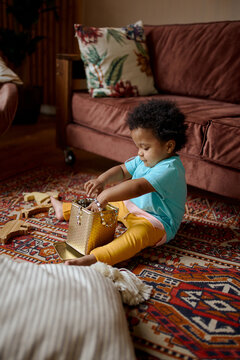 little girl playing and spending time at home