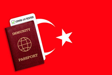 Immunity passport and test result for COVID-19 on flag of Turkey.