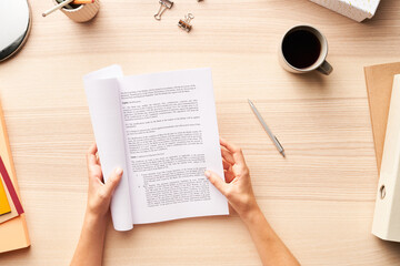 Crop worker reading papers over table