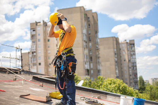 Working at elevations. Rope access, high-altitude outdoor work.