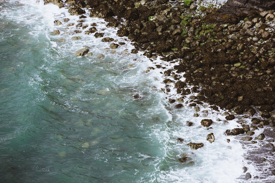 Waves lapping a rocky shore