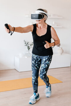 Elderly female athlete during VR workout