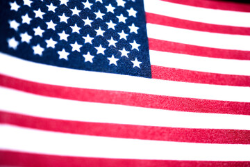 Macro Shot Of Handheld American Flag On Coarse Fabric - obrazy, fototapety, plakaty