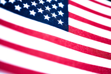 Macro Shot Of Handheld American Flag On Coarse Fabric