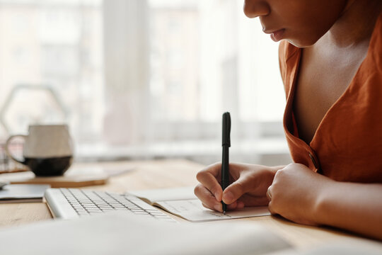Girl Writing Essay At Home